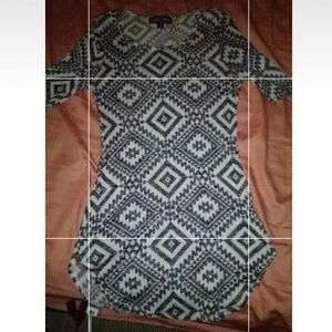 A half dress type of top.Worn once; Was big on me